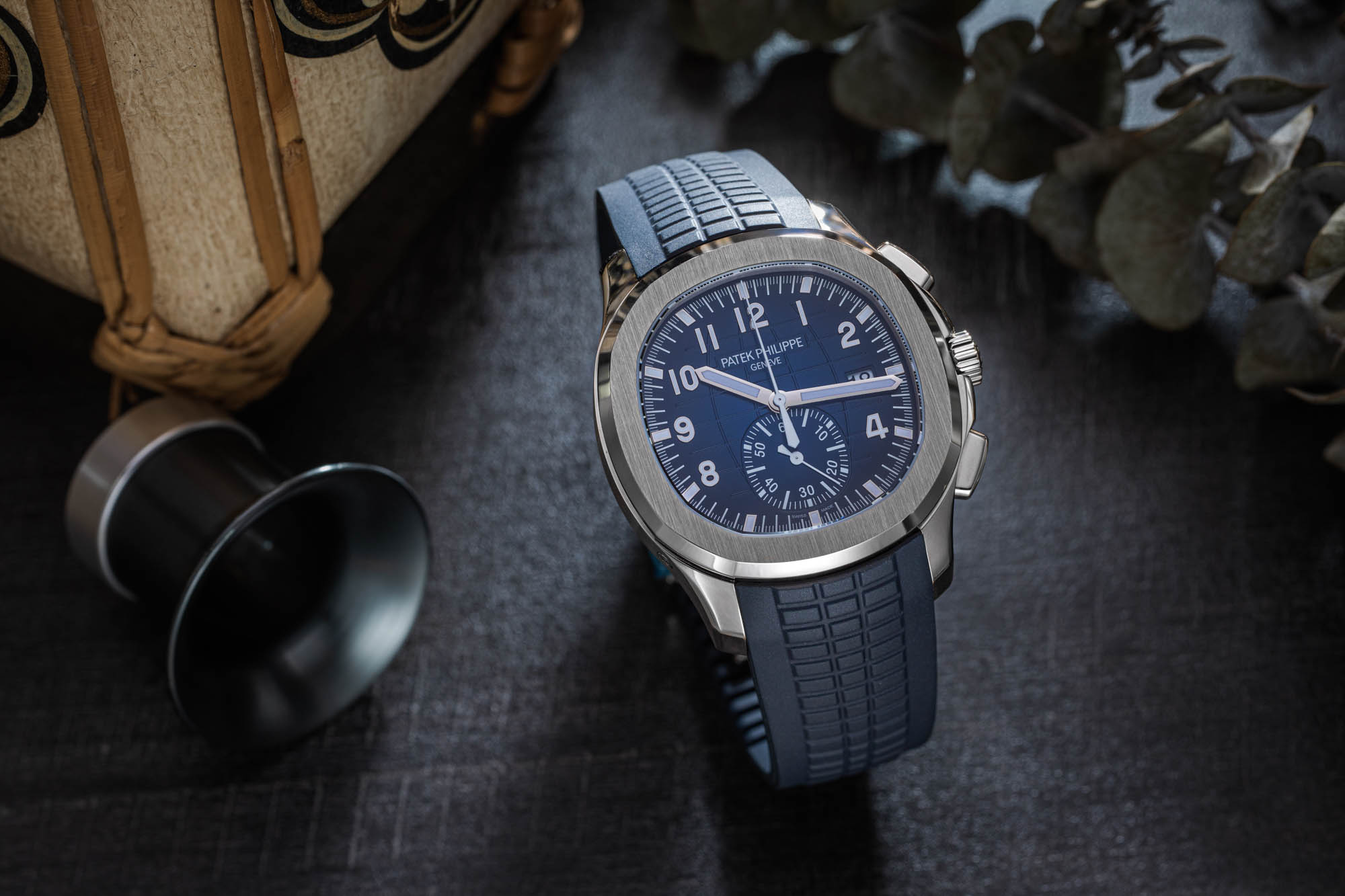 Patek Philippe Aquanaut Flyback Chronograph Ref. 5968G 001 Features A Blue Black Gradient Dial And Midnight Blue Composite Strap, Contrasting Nicely With Its White Gold Case, Bezel, And Crown.