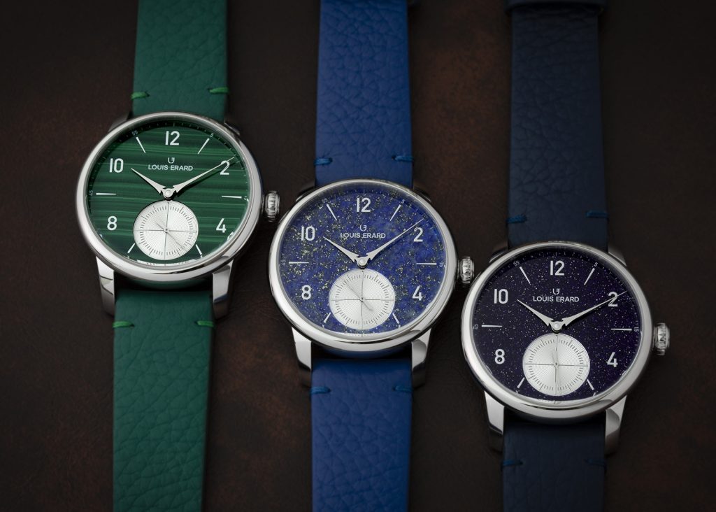 Three silver coloured watches. One with green stone dial, one with blue stone dial, one blue glass dial.