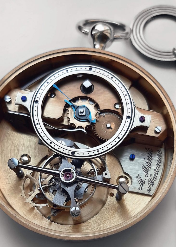 Close up of a marine design pocket watch