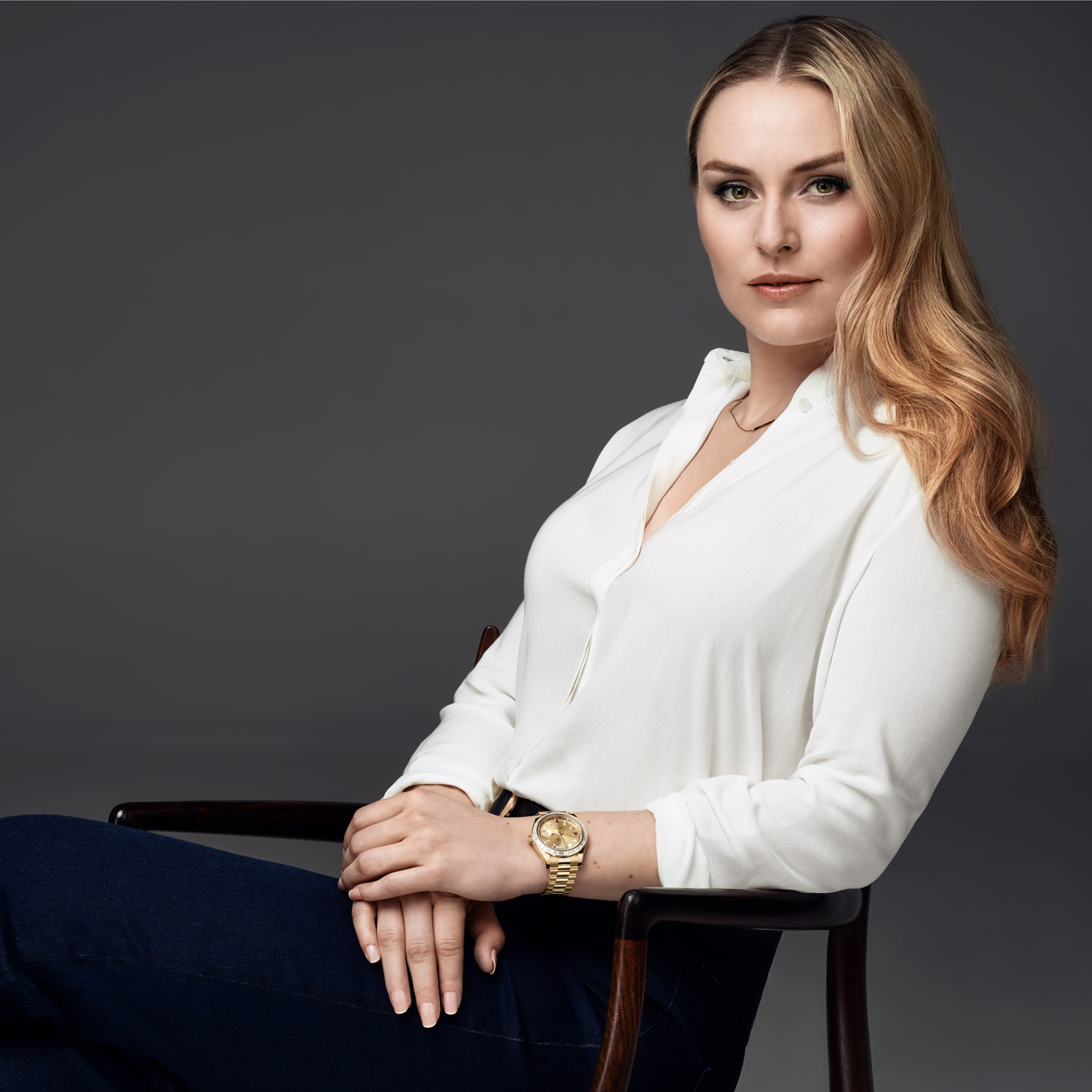 Champion skier Lindsey Vonn wearing a yellow gold Day-Date